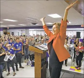  ?? Doug Hoke Oklahoman ?? SEN. Elizabeth Warren, seen at a teachers’ rally, gave the Associated Press a copy of an audit that appears to support lawsuits accusing Navient of unfair practices.