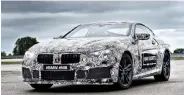  ??  ?? BMW 8 Series under camouflage.