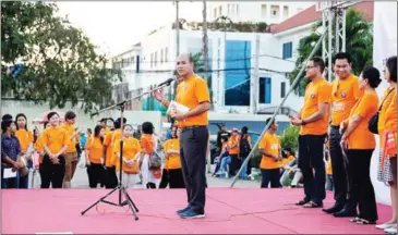  ?? PHA LINA ?? Prime Minister Hun Sen’s son Hun Many talks at Wat Botum Park in Phnom Penh in 2015, at an event during a campaign to end violence against women.