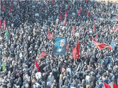  ?? ATTA KENARE AFP VIA GETTY IMAGES ?? Iranians mourn Qassem Soleimani. “If western powers want tranquilit­y and stability in the Middle East, they must give up their divide-and-rule policy and let each government be free to follow their faith, ideology and religion,” Raza Kara writes.