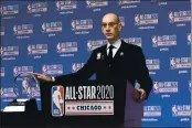  ?? DAVID BANKS — AP PHOTO ?? NBA Commission­er Adam Silver unveils the NBA All-Star Game Kobe Bryant MVP Award during a news conference in Chicago on Feb. 15, 2020.