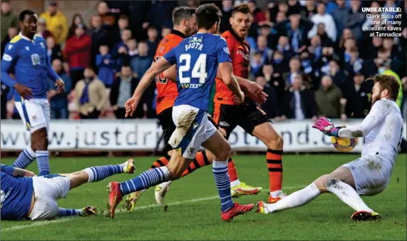  ?? ?? UNBEATABLE: Clark pulls off one of many excellent saves at Tannadice