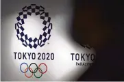  ?? EUGENE HOSHIKO / AP 2021 ?? The cost for last year’s COVID-delayed Tokyo Olympics was twice what was forecast in 2013 when the city was awarded the Games.