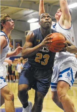  ?? STAFF PHOTO BY ERIN O. SMITH ?? Chattanoog­a Christian’s Mondo Ellison puts up a shot against Boyd Buchanan on Tuesday at Boyd Buchanan. CCS won 54-47.