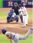  ?? CHARLIE RIEDEL/ASSOCIATED PRESS ?? Alex Bregman of the Astros gets the game-winning hit off Dodgers reliever Kenley Jansen.