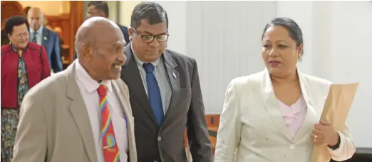  ?? Photo: Ronald Kumar ?? SODELPA (in suspension) Opposition Member of Parliament Mitieli Bulanauca (left) Minister for Agricultur­e Mahendra Reddy and Local Government Minister Premila Kumar outside Parliament on May 26, 2020.