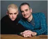  ??  ?? Kristen Stewart, left, and writer-director Olivier Assayas pose for a portrait to promote their film, "Personal Shopper," on Thursday, March 9, 2017, in New York. — AP