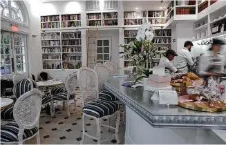  ?? Elizabeth Conley photos / Houston Chronicle ?? French windows let in natural light, and Louis XV-inspired chairs come from France.