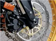  ?? ?? Unlike the ’87 original’s single disc set-up, the new bike has twin wavy discs and ABS-controlled Nissin twin-piston calipers. They’re full of power and feel.