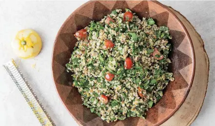  ?? [PHOTO BY JENNIFER CHASE, FOR THE WASHINGTON POST] ?? Bulgur Salad With Spinach, Tomatoes and Herbs