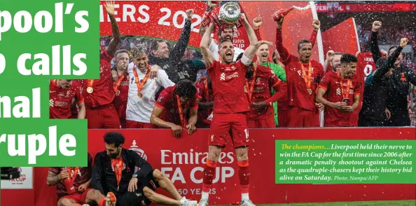  ?? Photo: Nampa/AFP ?? The champions…Liverpool held their nerve to win the FA Cup for the first time since 2006 after a dramatic penalty shootout against Chelsea as the quadruple-chasers kept their history bid alive on Saturday.