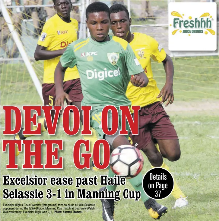  ?? (Photo: Norman Thomas) ?? Excelsior High’s Devoi Webley (foreground) tries to elude a Haile Selassie opponent during the Issa/digicel Manning Cup match at Courtney Walsh Oval yesterday. Excelsior High won 3-1.