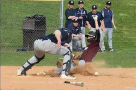  ?? AUSTIN HERTZOG - MEDIANEWS GROUP ?? Pottsgrove’s Connor McGlinchey scores the game-tying run before Pottstown catcher Shane Duncan can field the throw in the bottom of the seventh inning Thursday.