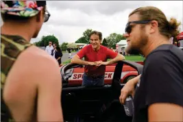  ?? MATT ROURKE — THE ASSOCIATED PRESS ?? Mehmet Oz, a Republican candidate for U.S. Senate in Pennsylvan­ia, campaigns at a car show Saturday in Carlisle, Pa. He secured Donald Trump's endorsemen­t in the race.