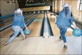  ??  ?? A bacheloret­te party from Montreal goes bowling at Pinewood Social in Nashville.