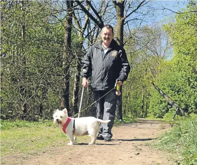  ?? Picture: David Wardle. ?? Peter Scobie walks his dog on one of the paths affected by nuisance bikers.
