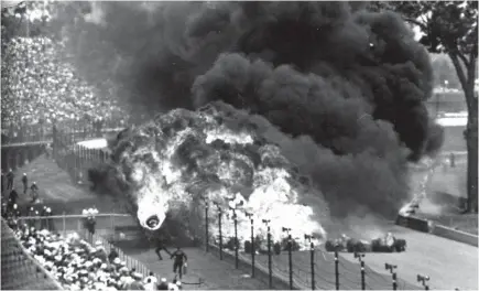  ?? BOB DAUGHERTY/AP ?? Eddie Sachs and Dave MacDonald died in this fiery crash in the 1964 Indianapol­is 500.