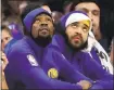  ?? ROB CARR — GETTY IMAGES ?? The Warriors’ Kevin Durant, left, was injured Saturday during a dunk attempt against the 76ers.