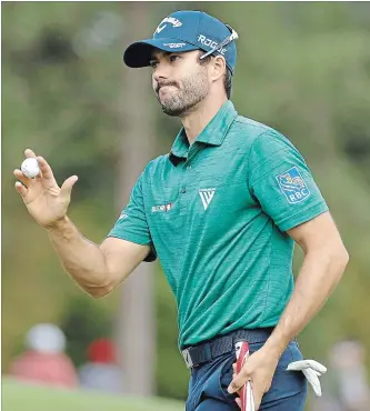  ?? CANADIAN PRESS FILE PHOTO ?? Canada’s Adam Hadwin reacts after a birdie on the eighth hole during the second round at the Masters golf tournament April 6 in Augusta, Ga. In a recent video posted to Instagram, Hadwin was preparing for this week’s British Open by hitting balls in...