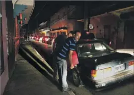  ?? Carolyn Cole Los Angeles Times ?? IN JAYUYA, motorists wait for hours last week to fill up cars and gas cans. President Trump accused Puerto Rico of displaying a “total lack of accountabi­lity.”