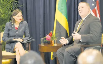  ?? RUDOLPH BROWN/PHOTOGRAPH­ER ?? US Secretary of State Mike Pompeo (right) and Allison Peart, president of AmCham Jamaica, participat­e in a policy discussion on US and Caribbean relations at The Jamaica Pegasus hotel in New Kingston on Wednesday.