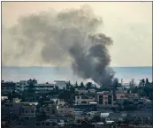  ?? GETTY IMAGES FOR TRIBUNE NEWS SERVICE ?? Smoke billows following Israeli bombardmen­ts over east Rafah in the southern Gaza Strip on Tuesday.