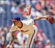  ?? THE ASSOCIATED PRESS ?? Phillies starting pitcher Vince Velasquez gracefully uncorks a pitch during the first inning Wednesday against the Nationals. He’d look great for four full innings. And then he wasn’t.