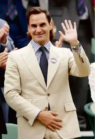  ?? CLIVE BRUNSKILL/GETTY IMAGES ?? The retired Roger Federer, who won a men’s-record eight of his 20 Grand Slam titles at the All England Club, was in the front row of the Royal Box.