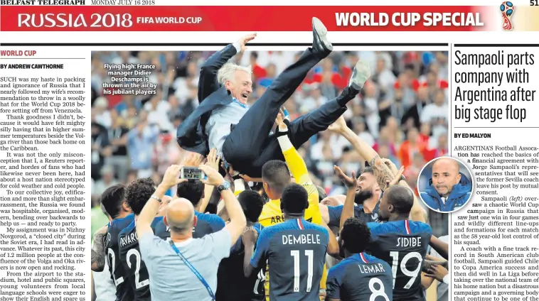  ??  ?? Flying high: France manager Didier Deschamps is thrown in the air by his jubilant players