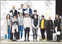  ?? ?? Al-Sabah, Al-Osaimi and Al-Sultan with the winners on the podium.