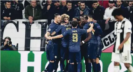  ??  ?? Manchester United stunned Juventus with two goals in the final five minutes to beat the Italian champions in Turin and give themselves a good chance of qualifying for the UEFA Champions League knockout stages