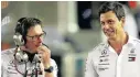  ?? Picture: GETTY IMAGES/ CHARLES COATES ?? PLANNERS: Andrew Shovlin and Toto Wolff working on team strategy.