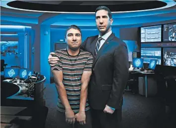  ?? PEACOCK PHOTOS ?? Nick Mohammed, left, and David Schwimmer in the series “Intelligen­ce,” on the new streaming service Peacock.