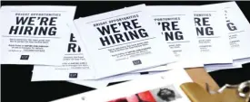  ??  ?? MIAMI: In this Oct 6, 2015 file photo, job applicatio­ns and informatio­n for the Gap Factory Store sit on a table during a job fair at Dolphin Mall in Miami. — AP