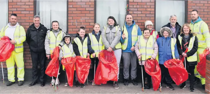  ??  ?? Youngsters helped to tidy up during the launch of a new litter-picking hub at KPC Youth and Community