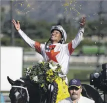  ?? Gregory Bull Associated Press ?? RICARDO SANTANA JR. won the Breeders’ Cup Sprint aboard Mitole when Santa Anita last hosted in 2019.