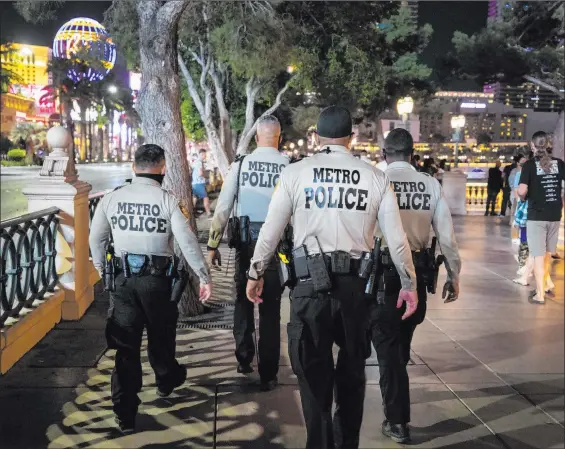  ?? Elizabeth Brumley ?? Las Vegas Review-journal @Elipagepho­to Las Vegas police patrol in October near the Bellagio. Spokesman Larry Hadfield said the department commonly sees clusters of retirement­s at the end of a calendar year.