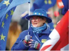  ??  ?? An anti-brexit demonstrat­or protests outside the Houses of Parliament in London on Monday. — Reuters