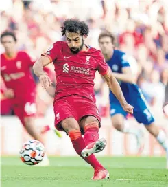  ??  ?? Liverpool’s Mo Salah equalises from the penalty spot