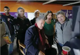  ?? (Ziv Koren/United King Films) ?? A BEHIND-THE-SCENES photo of ‘Shikun’ with Amos Gitai (center) and Irene Jacob (second from right).