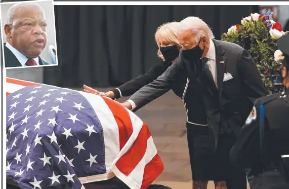  ?? Pictures: AFP ?? HONOUR; Democratic presidenti­al candidate Joe Biden and wife Jill pay their respects to the flag-draped casket of John Lewis (inset).