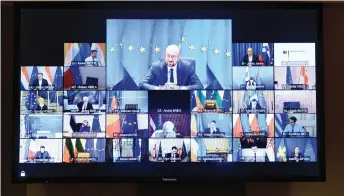  ?? — AFP photo ?? European Council President Charles Michel (centre, top) chairs a video conference on security and defence in Brussels.