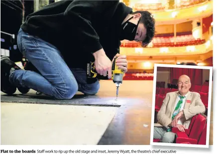  ??  ?? Flat to the boards Staff work to rip up the old stage and inset, Jeremy Wyatt, the theatre’s chief executive