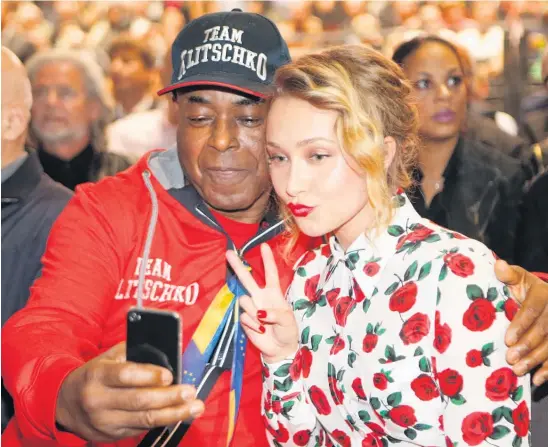  ?? Picture / AP ?? Physical intrusion on a celebrity is part of the selfie, as the phototaker’s arm around US actress Hayden Panettiere shows.