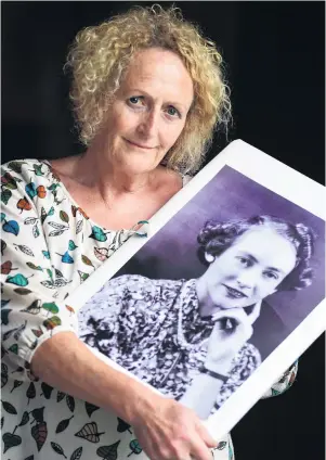  ?? PHOTO: STEPHEN JAQUIERY ?? Hang on Mum . . . Dunedin woman Sue Walthert, who has now had to cancel two memorial services since her mother died last year, says it has not stopped her from grieving or celebratin­g her mother’s life.