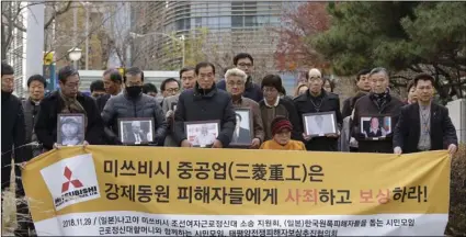  ?? PHOTO/AHN YOUNG-JOON ?? In this Nov. 29, 2018, file photo, victims of Japan’s at the Supreme Court in Seoul, South Korea. AP