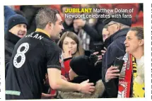  ??  ?? JUBILANT Matthew Dolan of Newport celebrates with fans