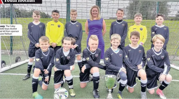  ??  ?? The Caley Thistle boys receive their kit from sponsor Louise Neilson