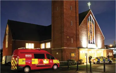  ??  ?? Parents’ worst nightmare: Emergency services at the church in Croydon on Wednesday