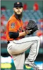  ?? AP/TONY GUTIERREZ ?? Former Arkansas Razorbacks pitcher Dallas Keuchel is hoping to return to the mound soon for Houston after missing several starts before the All-Star break because of a pinched nerve in his neck.